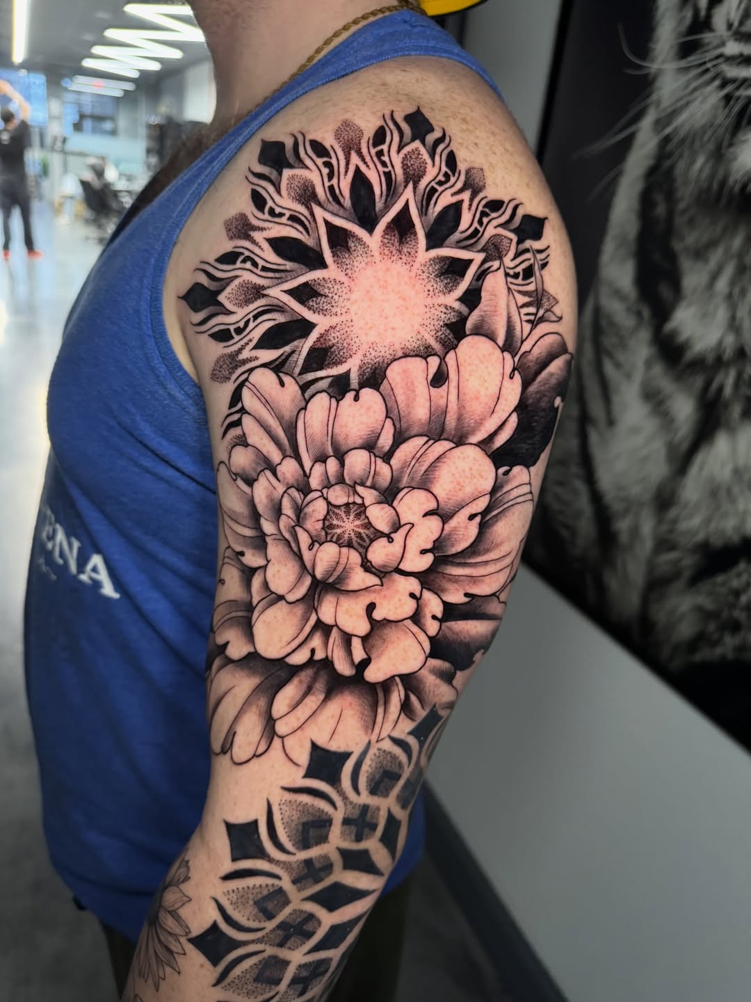 Floral Mandala Shoulder Piece with Bold Blackwork Accents