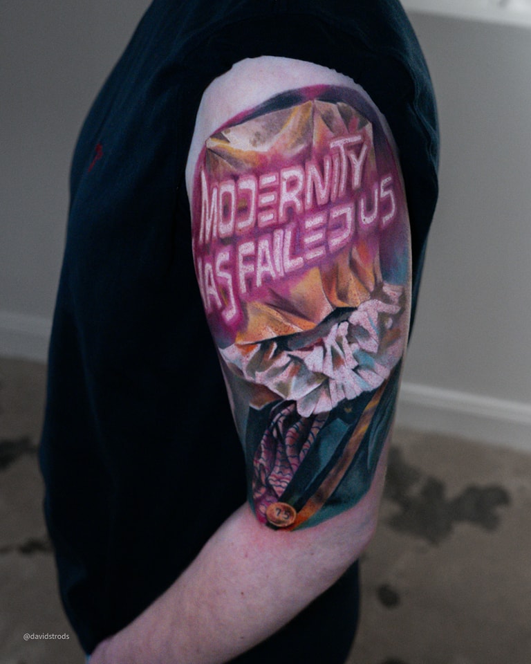 Bold Surreal Statement Lettering Tattoo