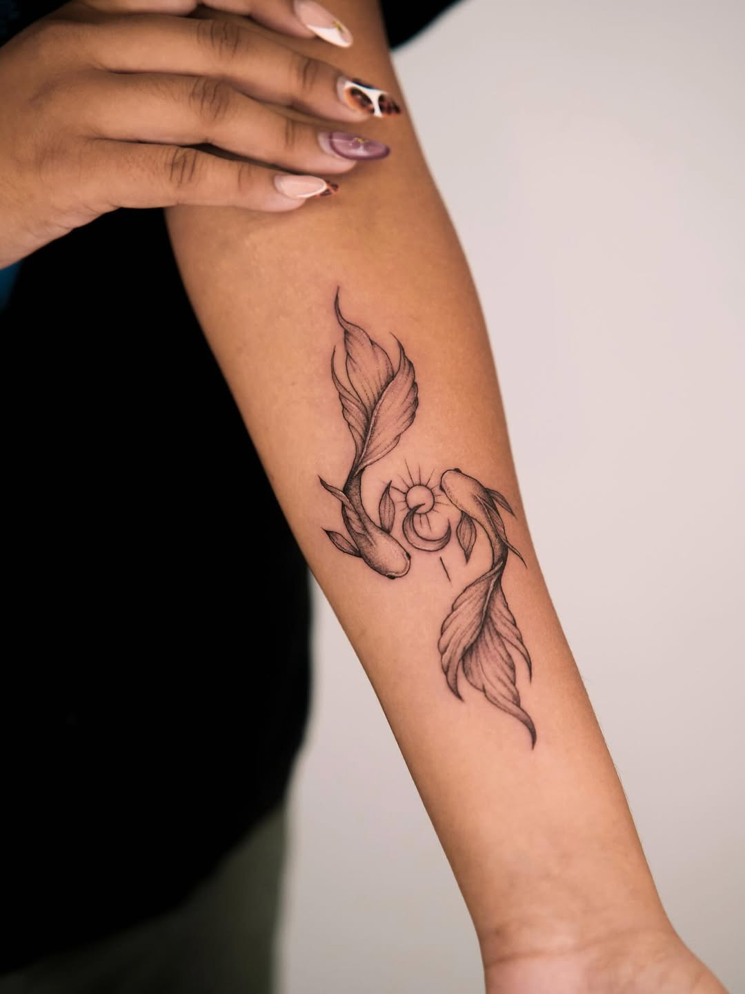 Fine Line Koi Fish Forearm Tattoo