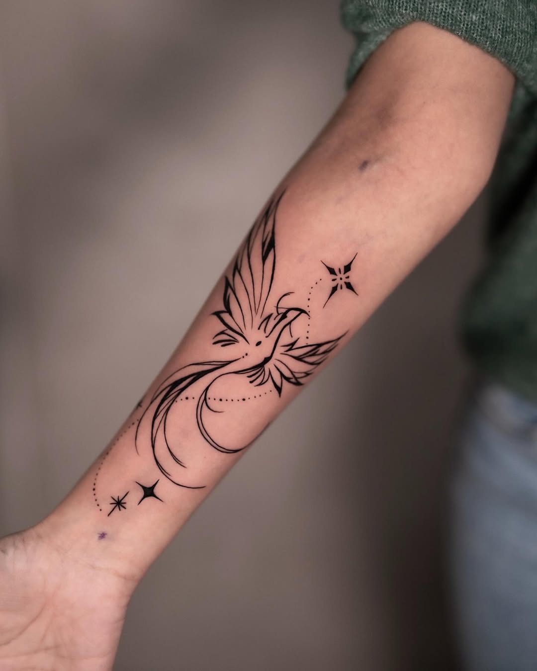 Minimal Phoenix Fine Line Forearm Tattoo