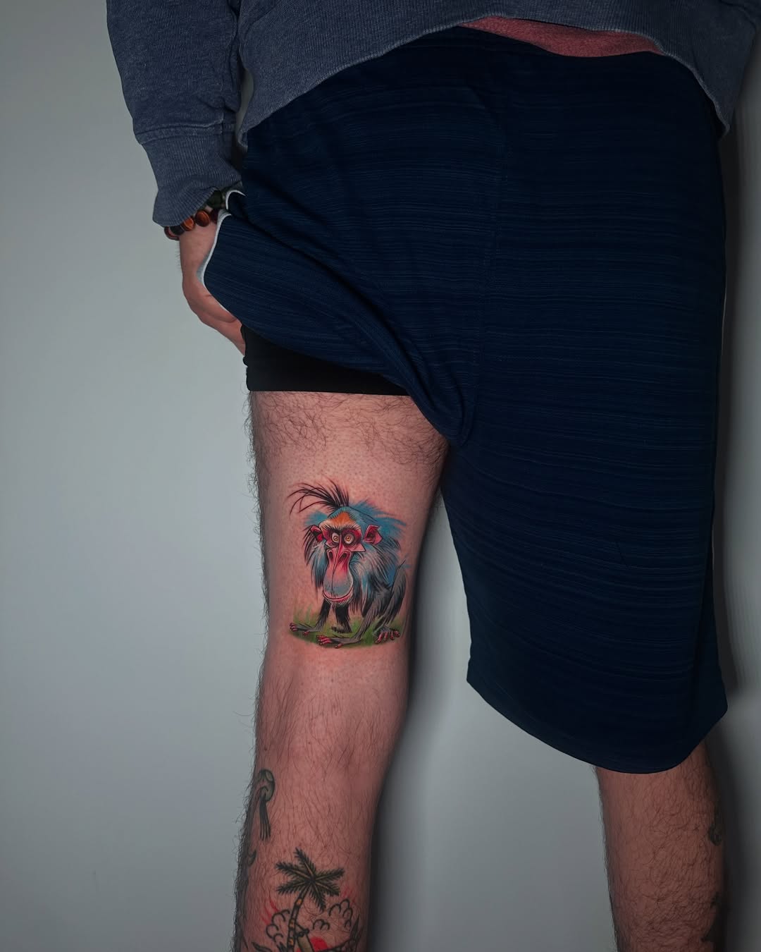 Expressive Mandrill Cartoon Realism Tattoo