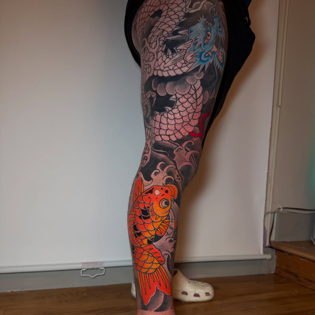 Bold Traditional Koi Fish Leg Tattoo