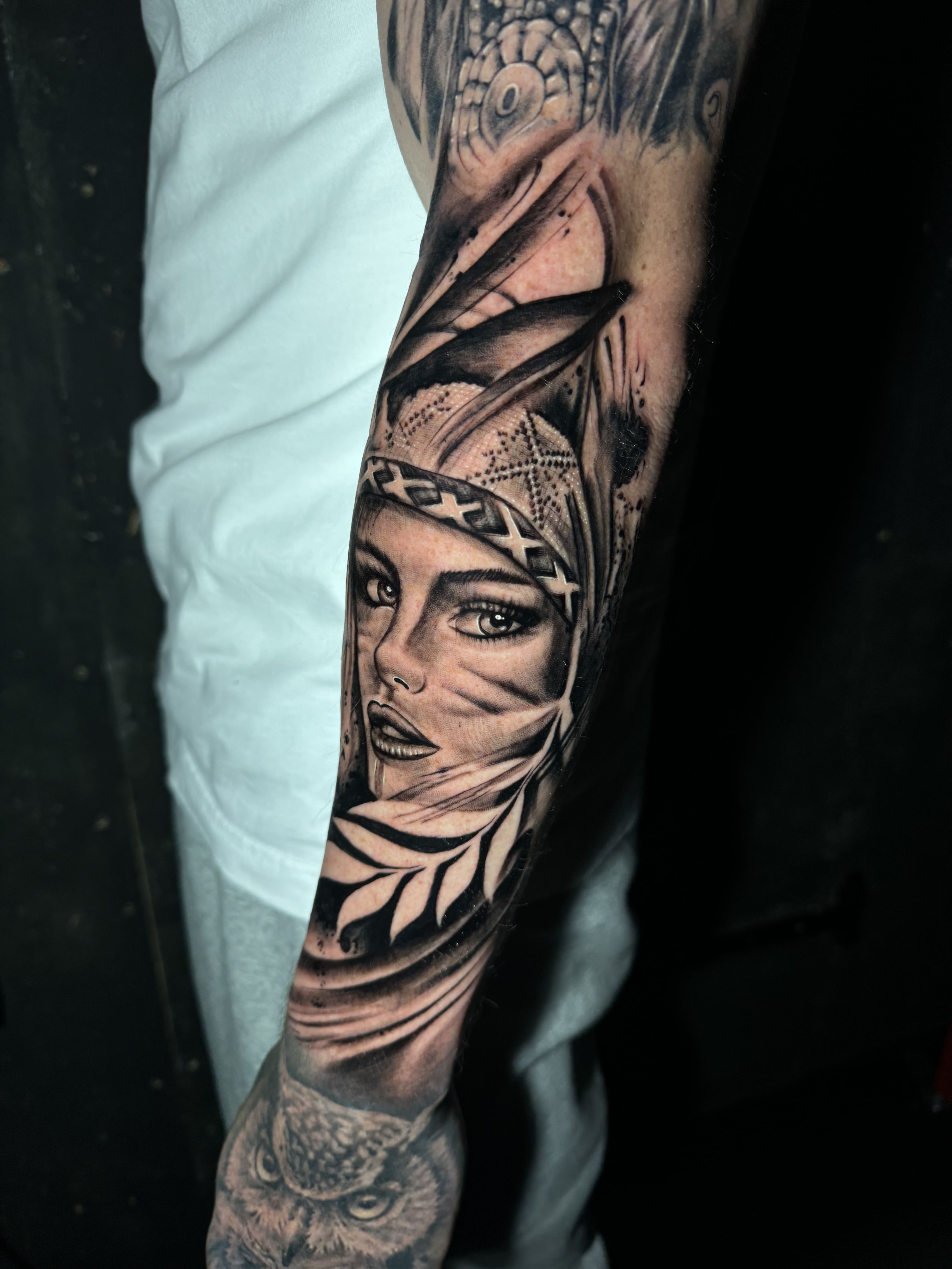 Realistic Native Woman Portrait Forearm Tattoo