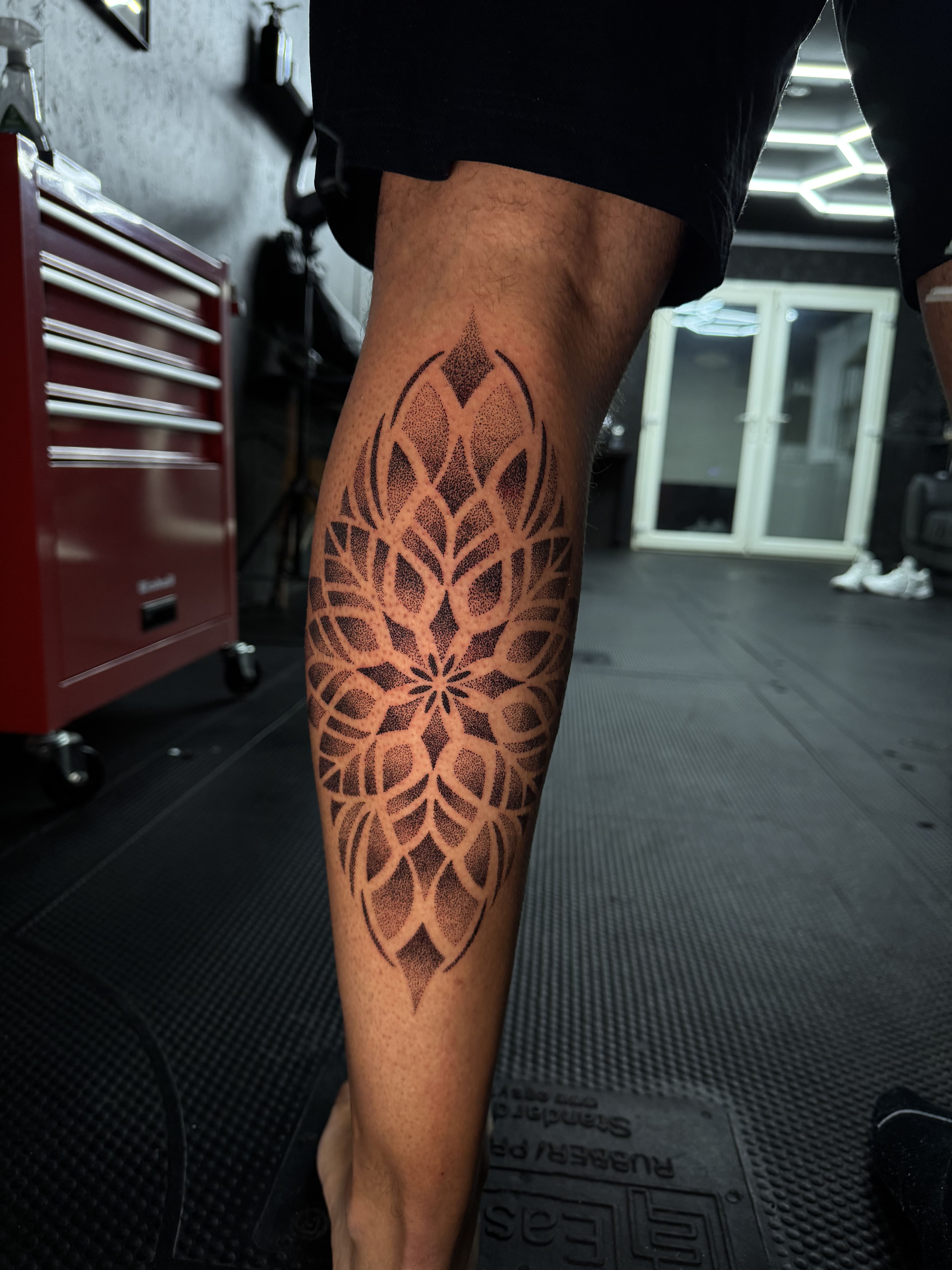 Symmetrical Mandala Dotwork Calf Tattoo