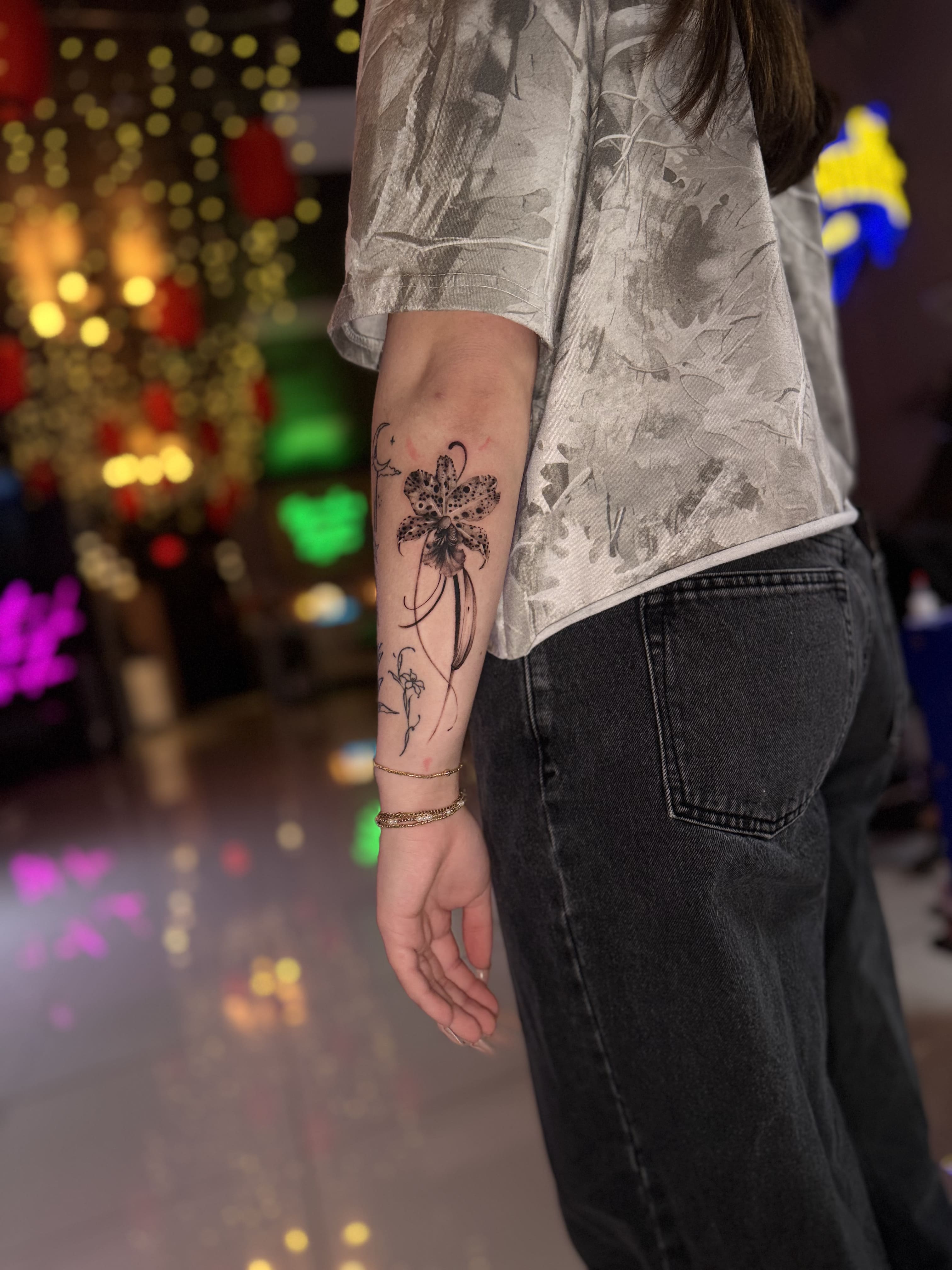 Elegant Orchid Fine Line Tattoo