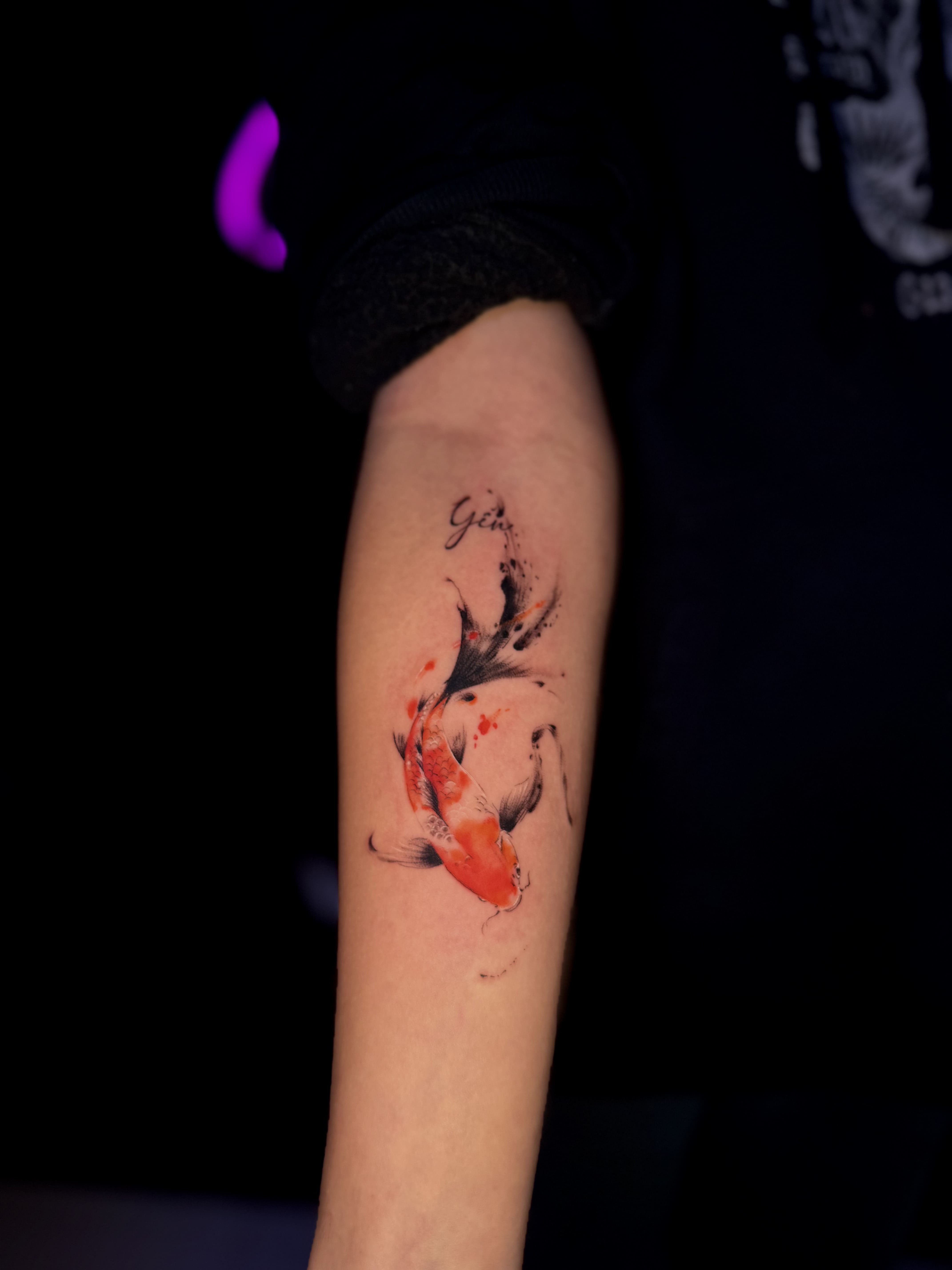 Minimalist Watercolor Koi Forearm Tattoo