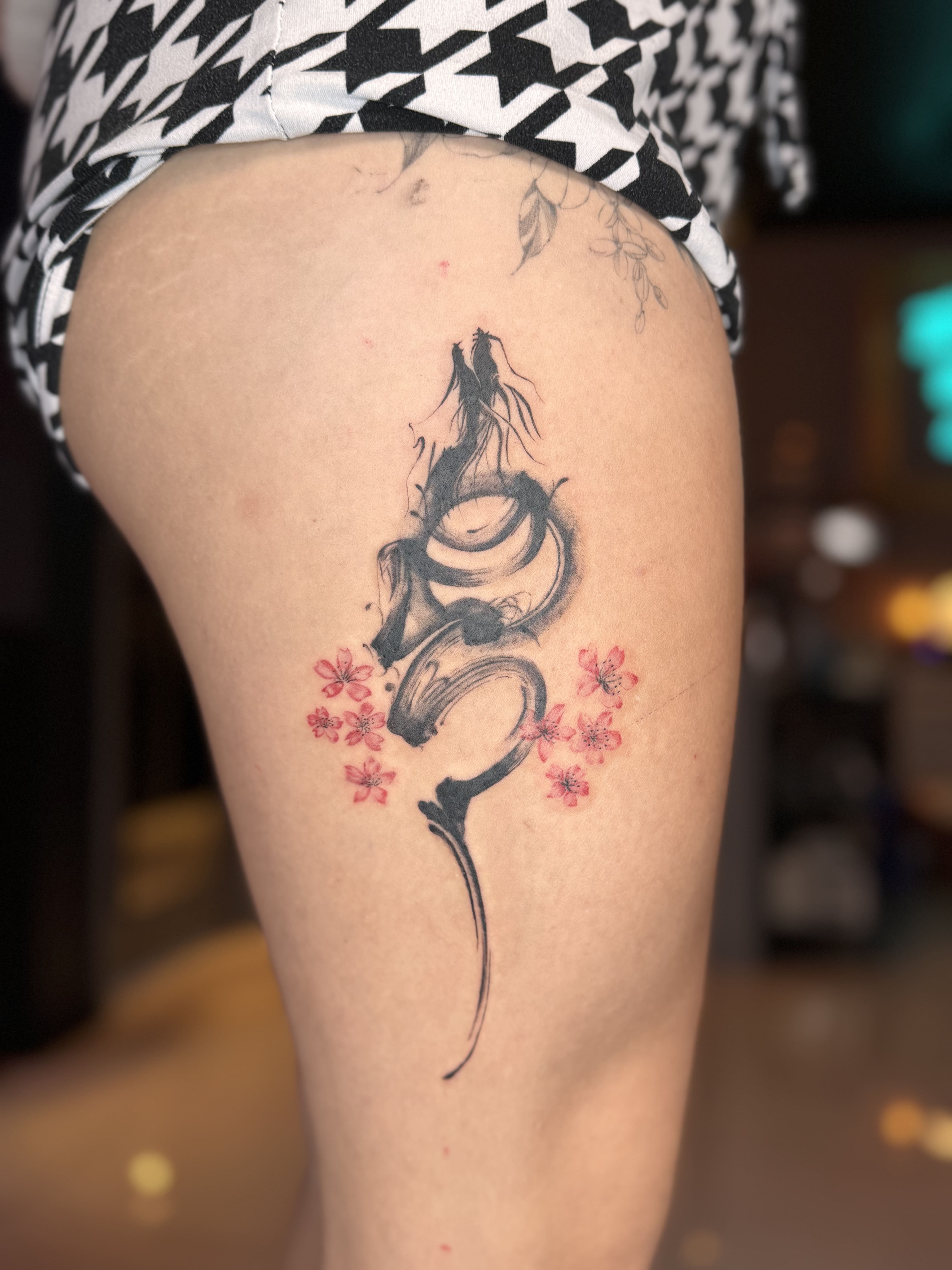 Floral Brushstroke Dragon Thigh Tattoo