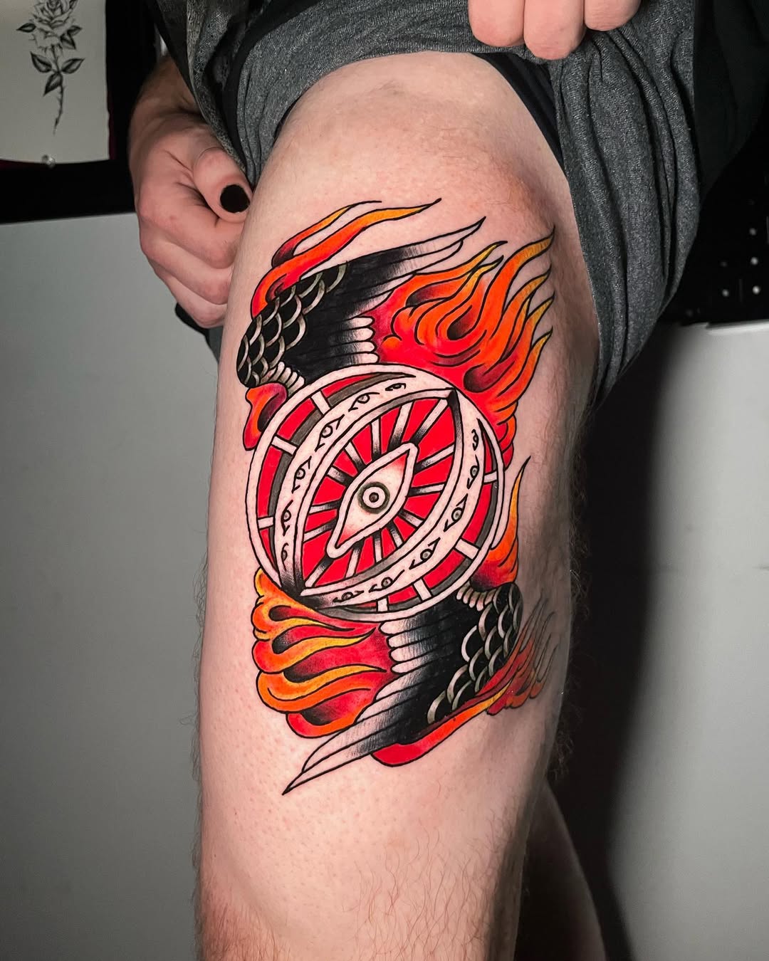 Traditional Flaming Ophanim Thigh Tattoo