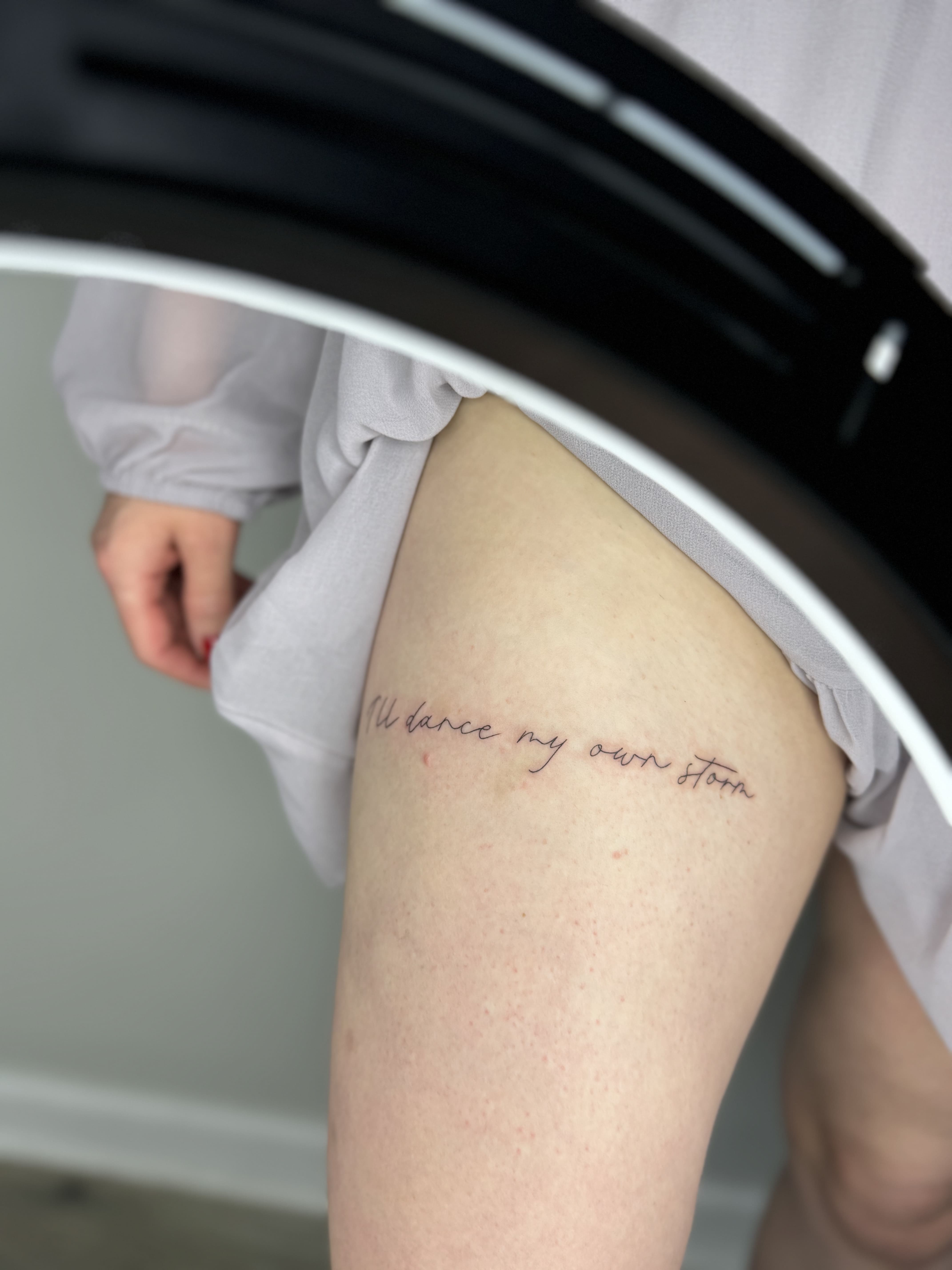 Fine Line Script Tattoo — “I’ll Dance My Own Storm”