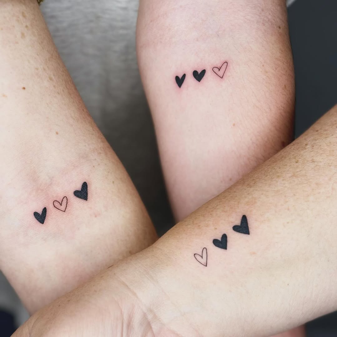 Minimalist Matching Heart Trio Tattoos