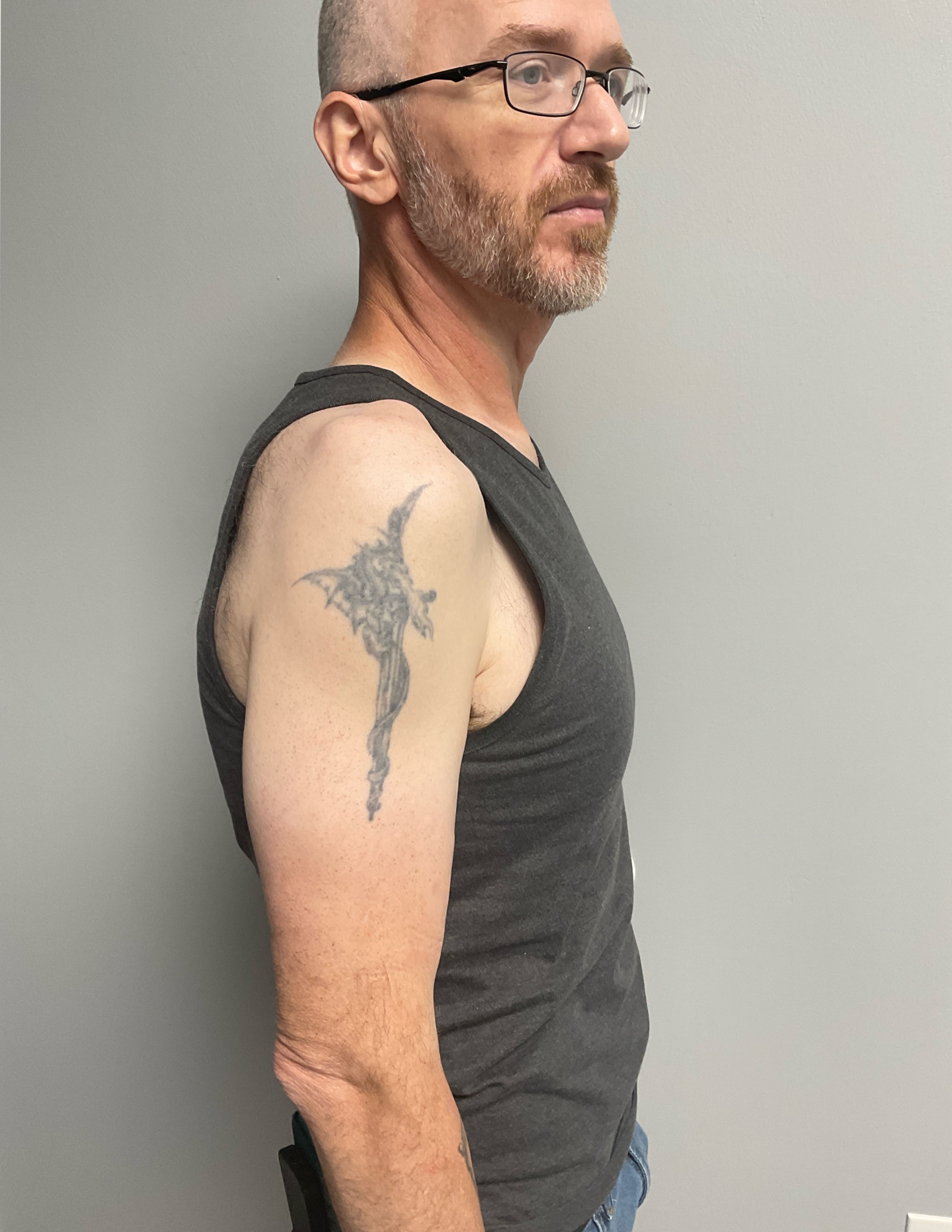 Dark Surreal Spirits Shoulder Tattoo