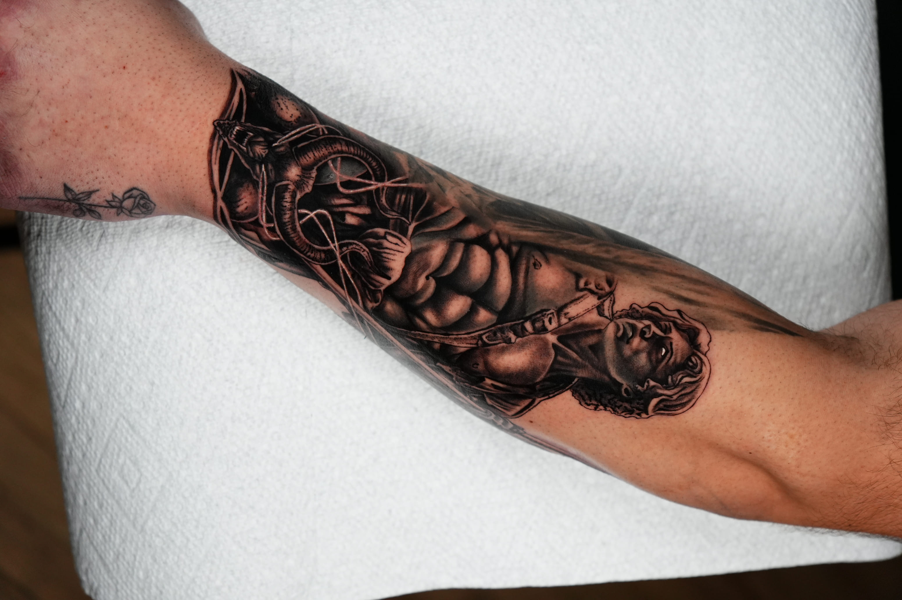 Michelangelo’s David Forearm Tattoo