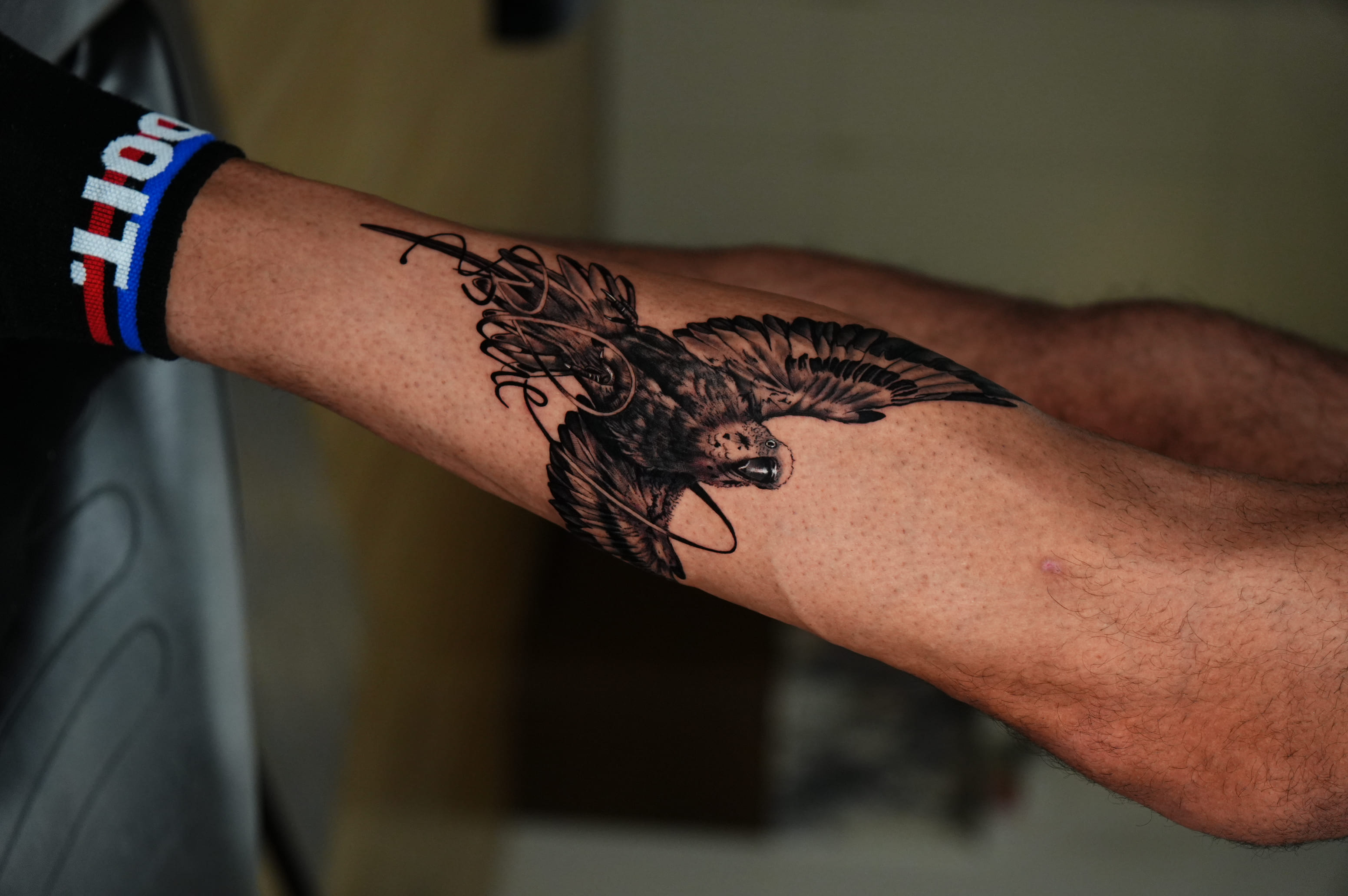 Flying Parrot Script Calf Tattoo