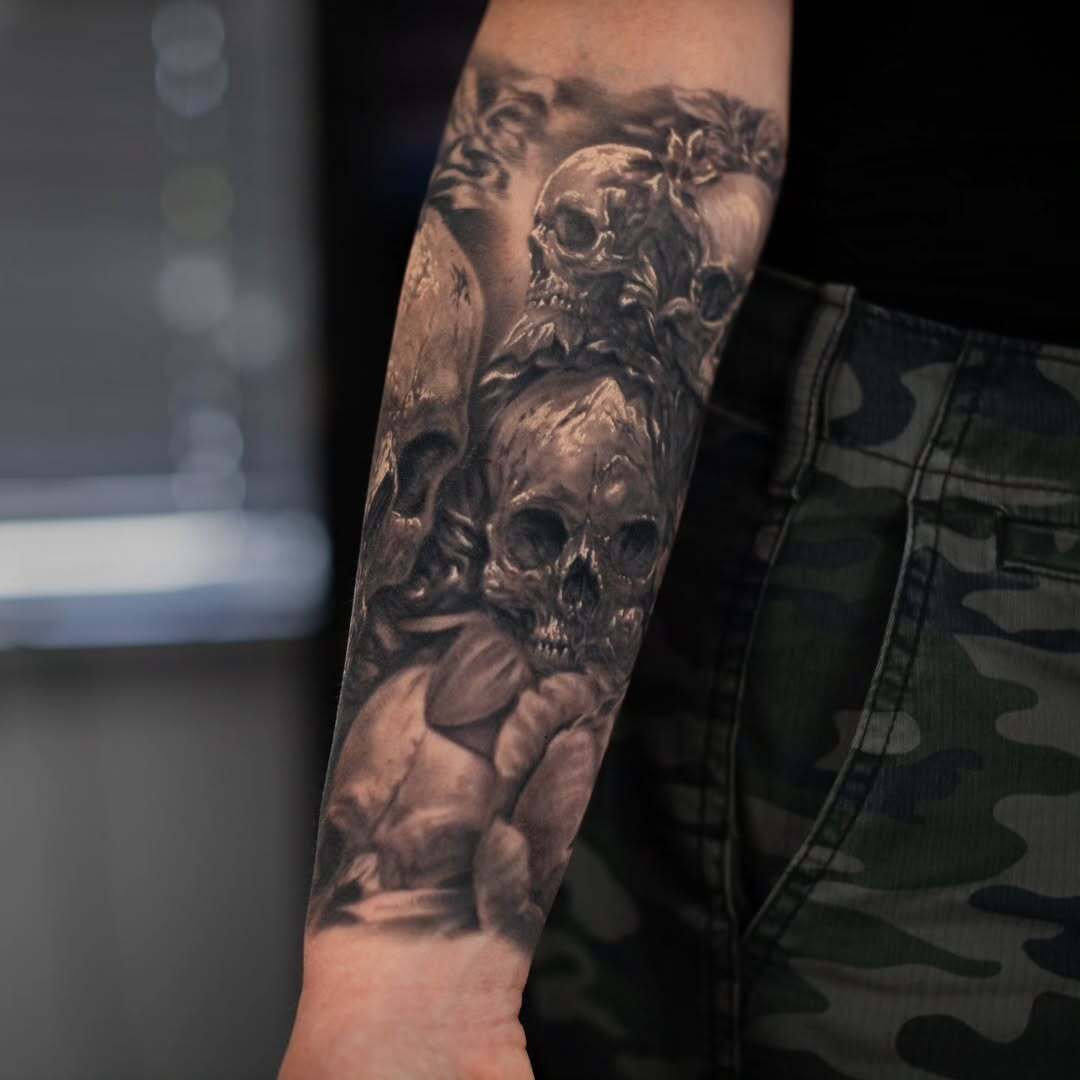Skull and Leaves Dark Realism Tattoo