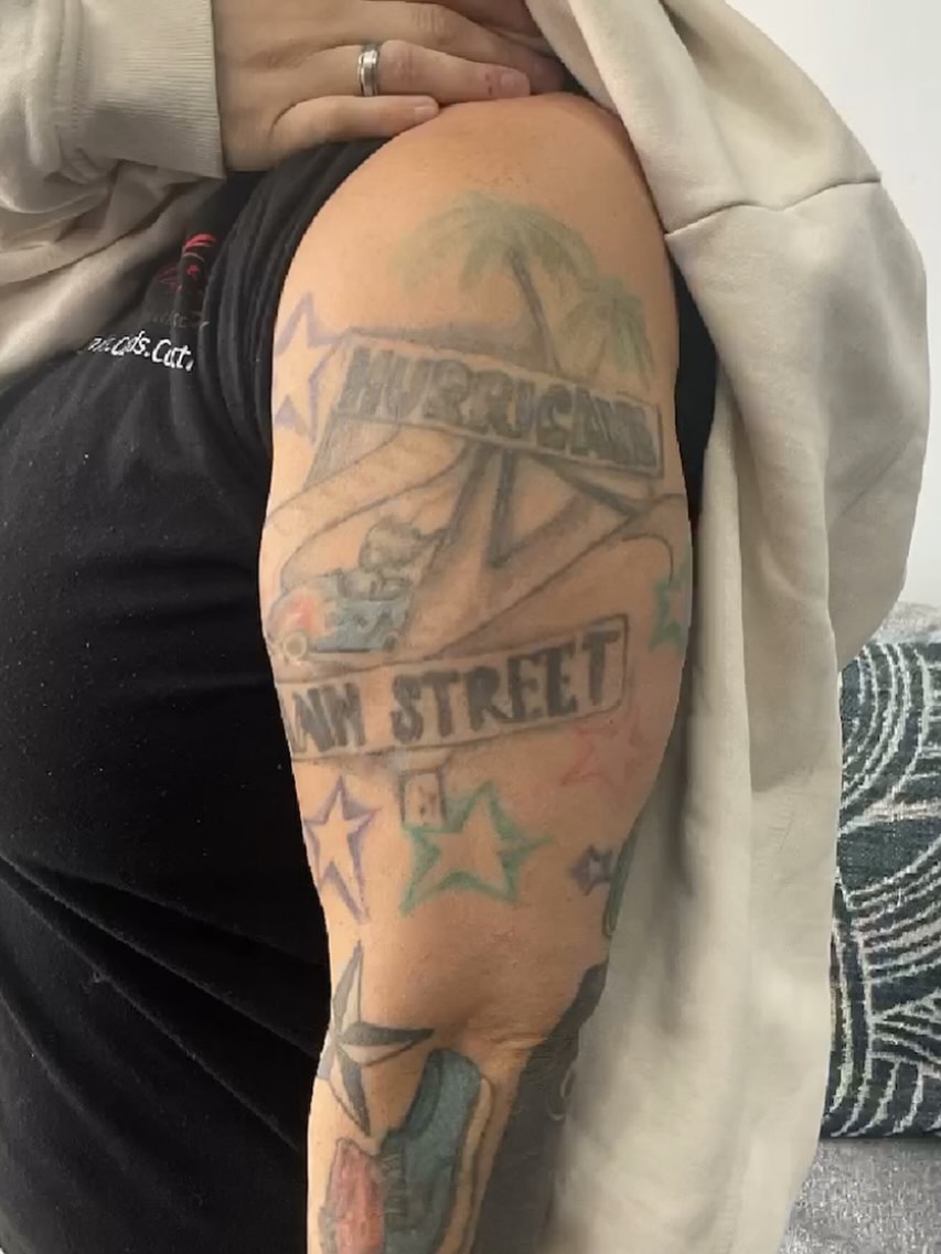 Ocean Wave and Surfer Shoulder Tattoo