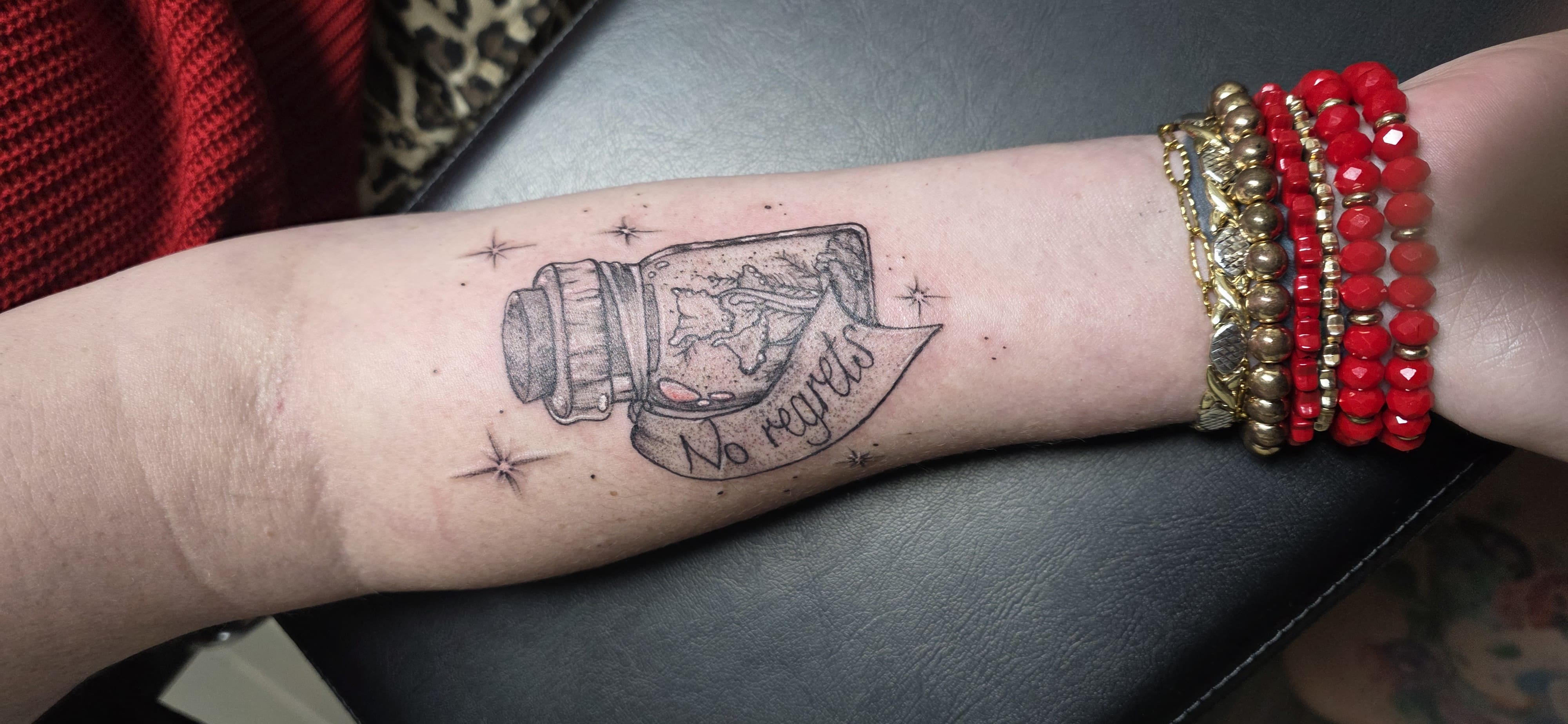 “No Regrets” Bottle Tattoo