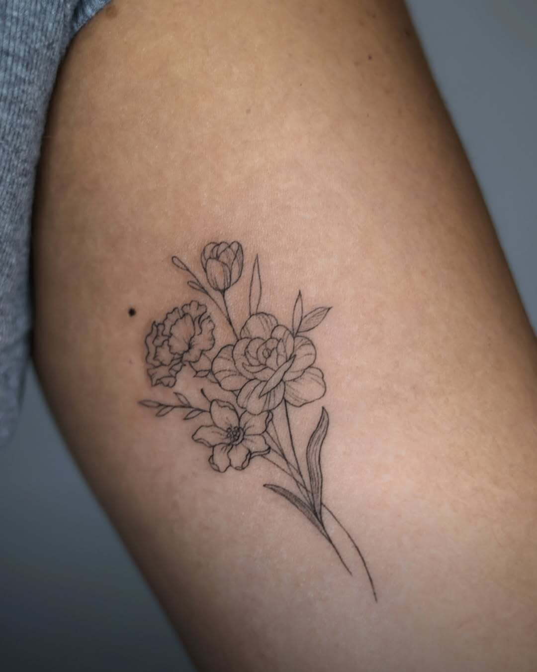 Fine Line Floral Bouquet Tattoo