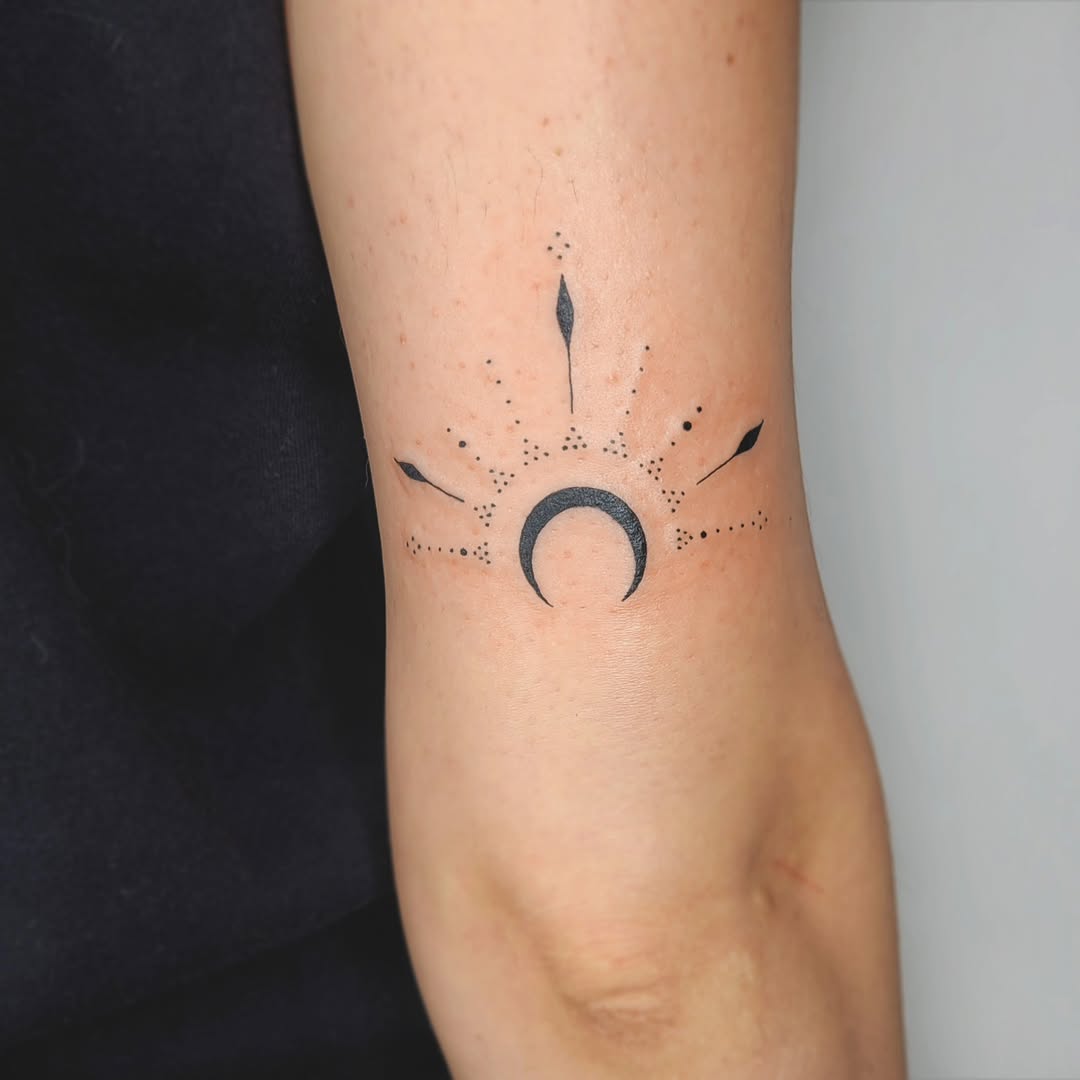 Minimalist Crescent Moon Symbol Tattoo