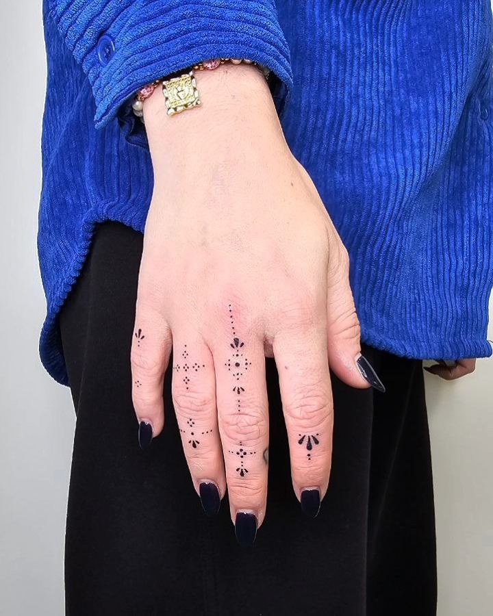 Minimalist Finger Ornament Tattoos