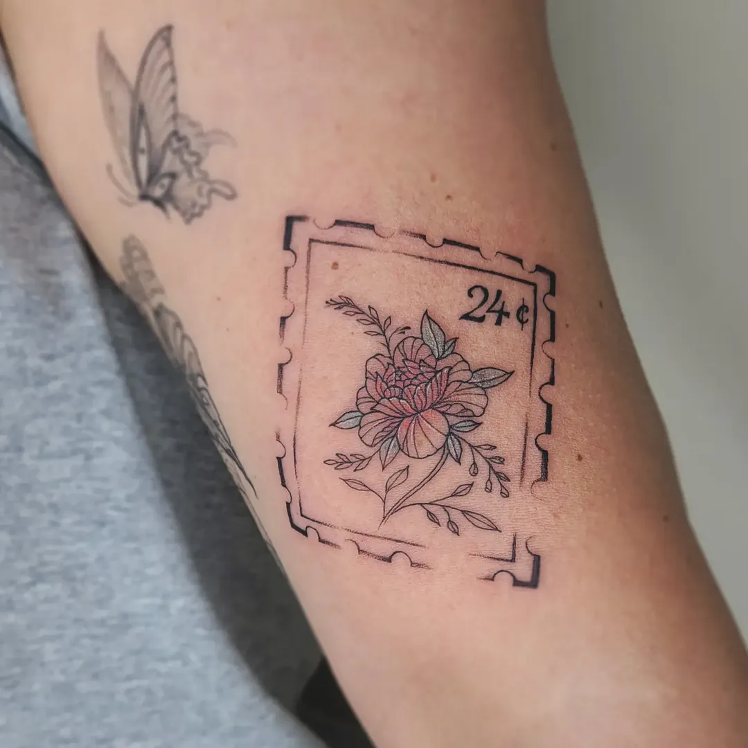 Floral Postage Stamp Tattoo