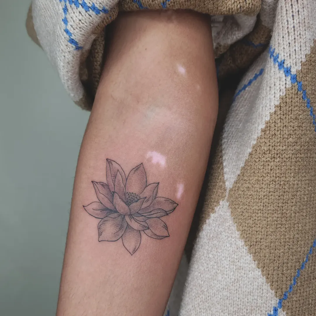 Fine Line Lotus Flower Tattoo