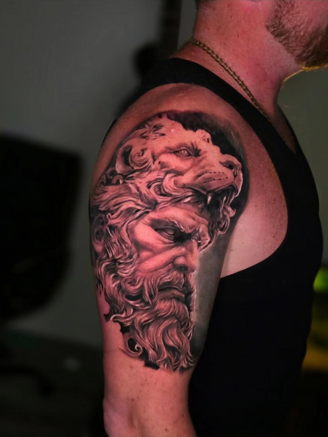 Greek God & Lion Realism Shoulder Tattoo