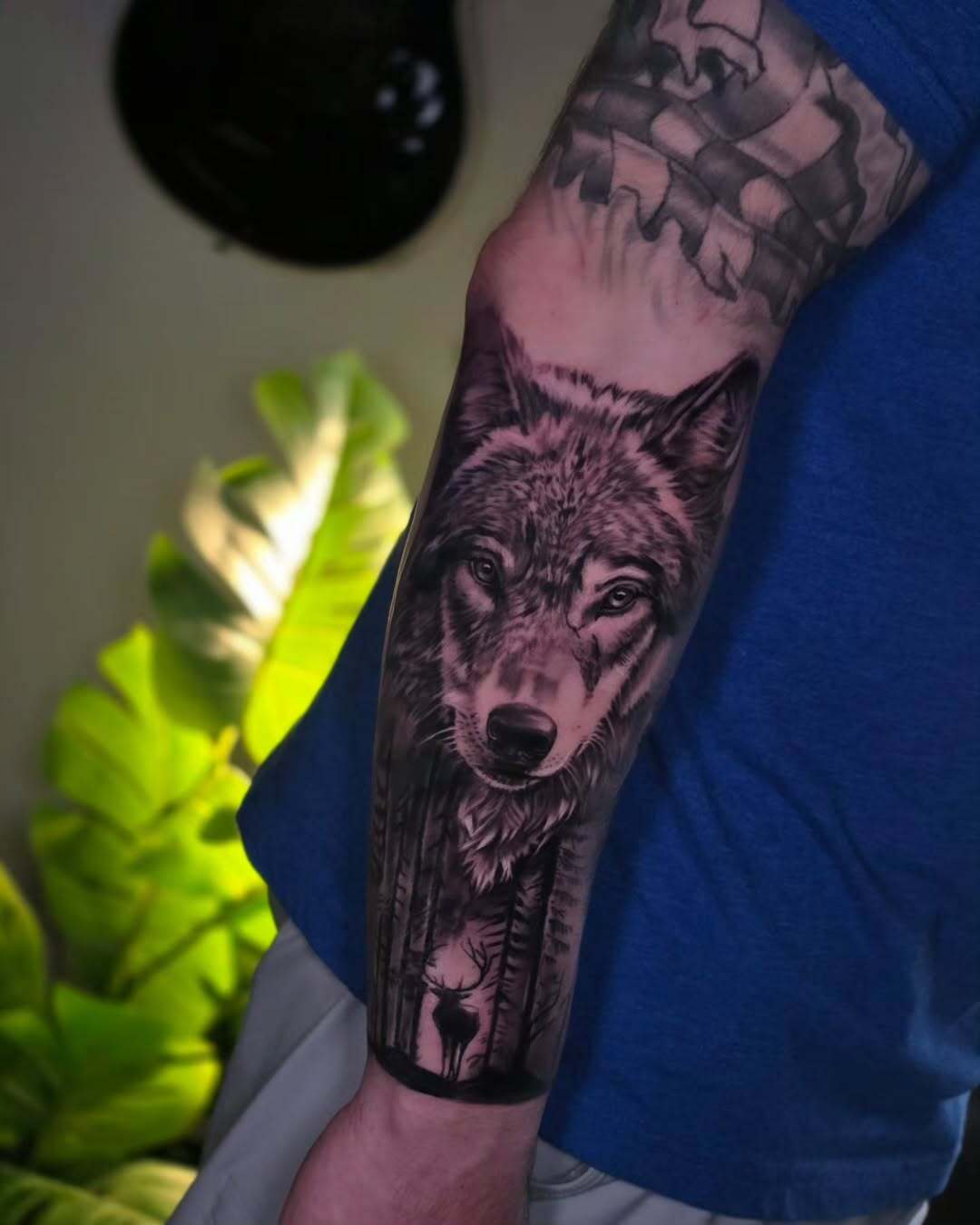 Wolf & Forest Realism Forearm Tattoo
