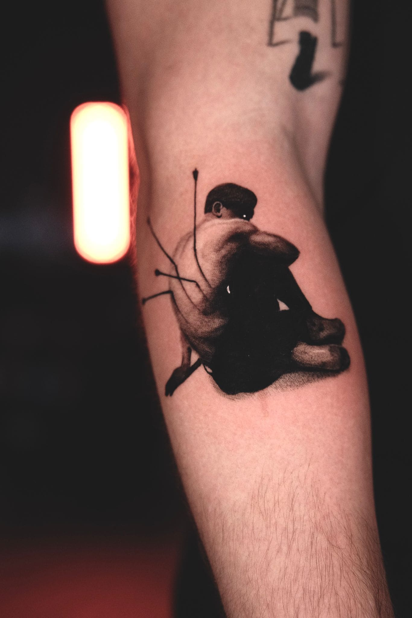 Minimalist Figure with Arrows Tattoo
