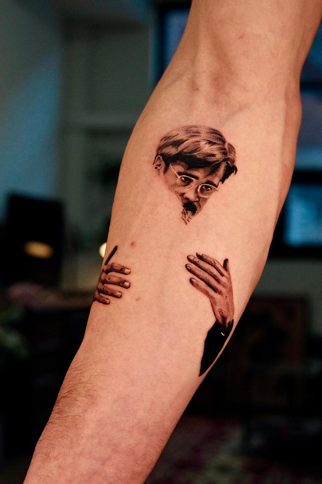Fragmented Portrait Tattoo with Floating Hands