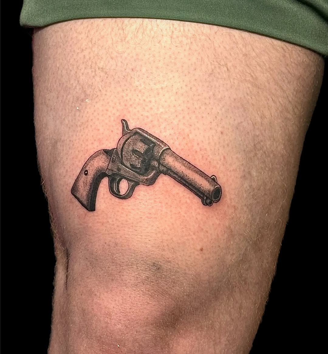 Minimal Realism Revolver Tattoo