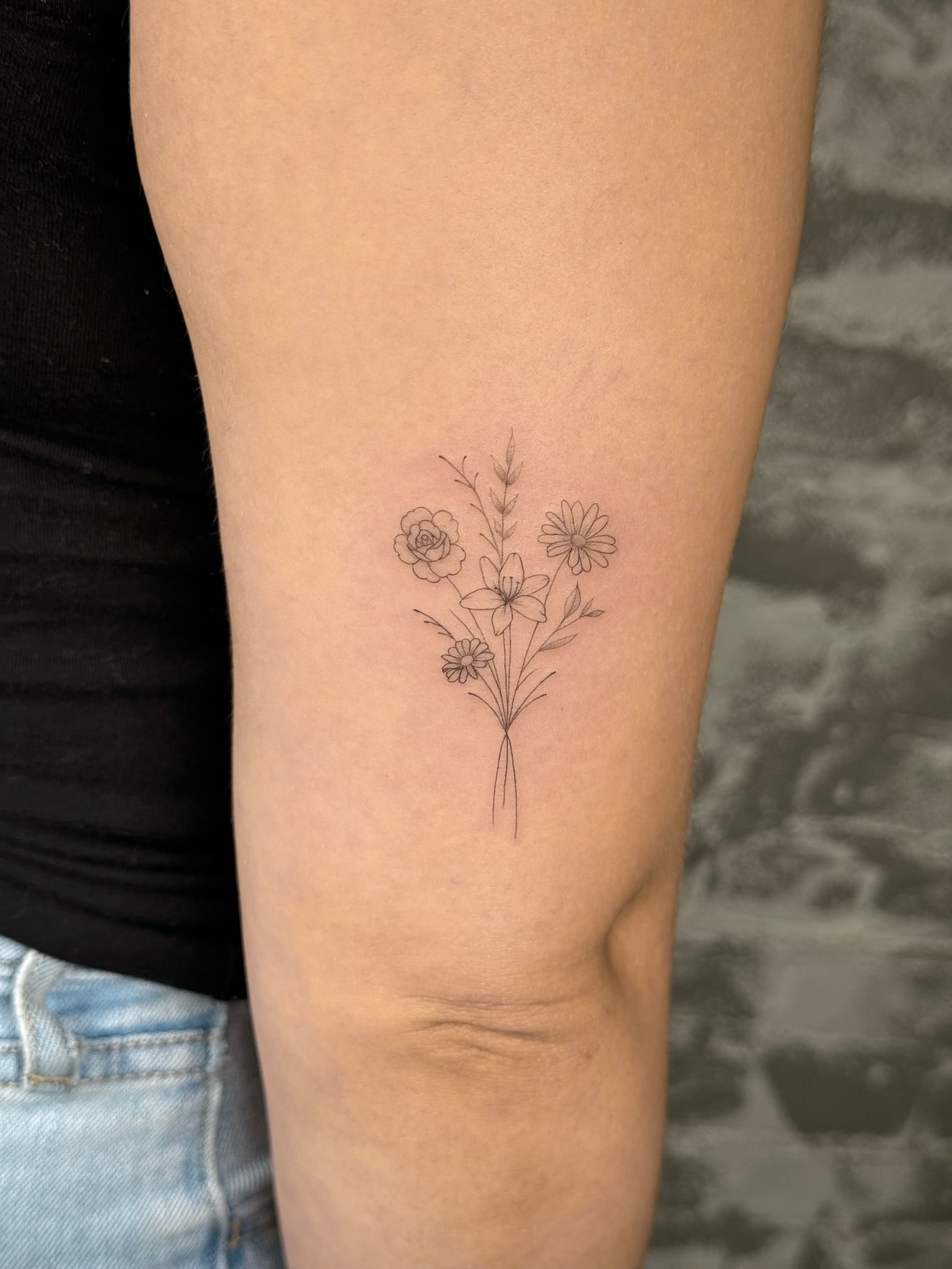 Fine Line Wildflower Bouquet Tattoo