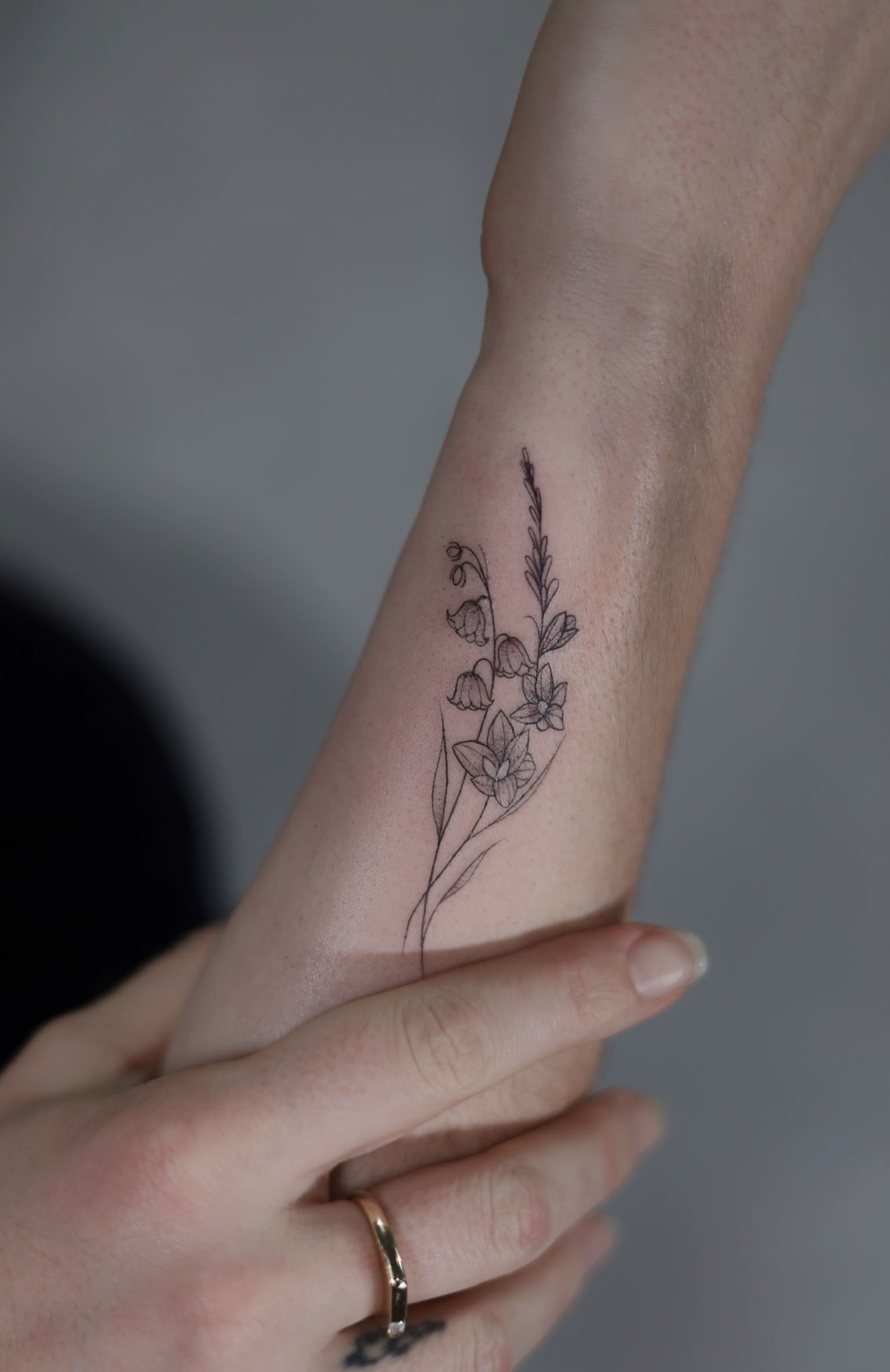 Fine Line Wildflower Stem Tattoo