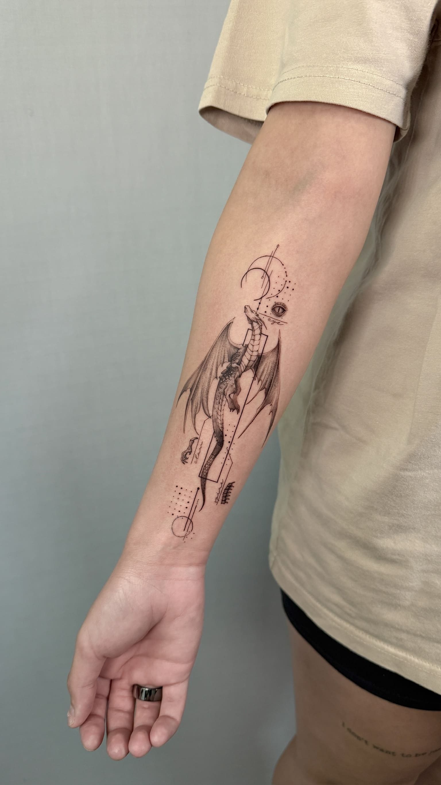 Geometric Dragon Fine Line Tattoo