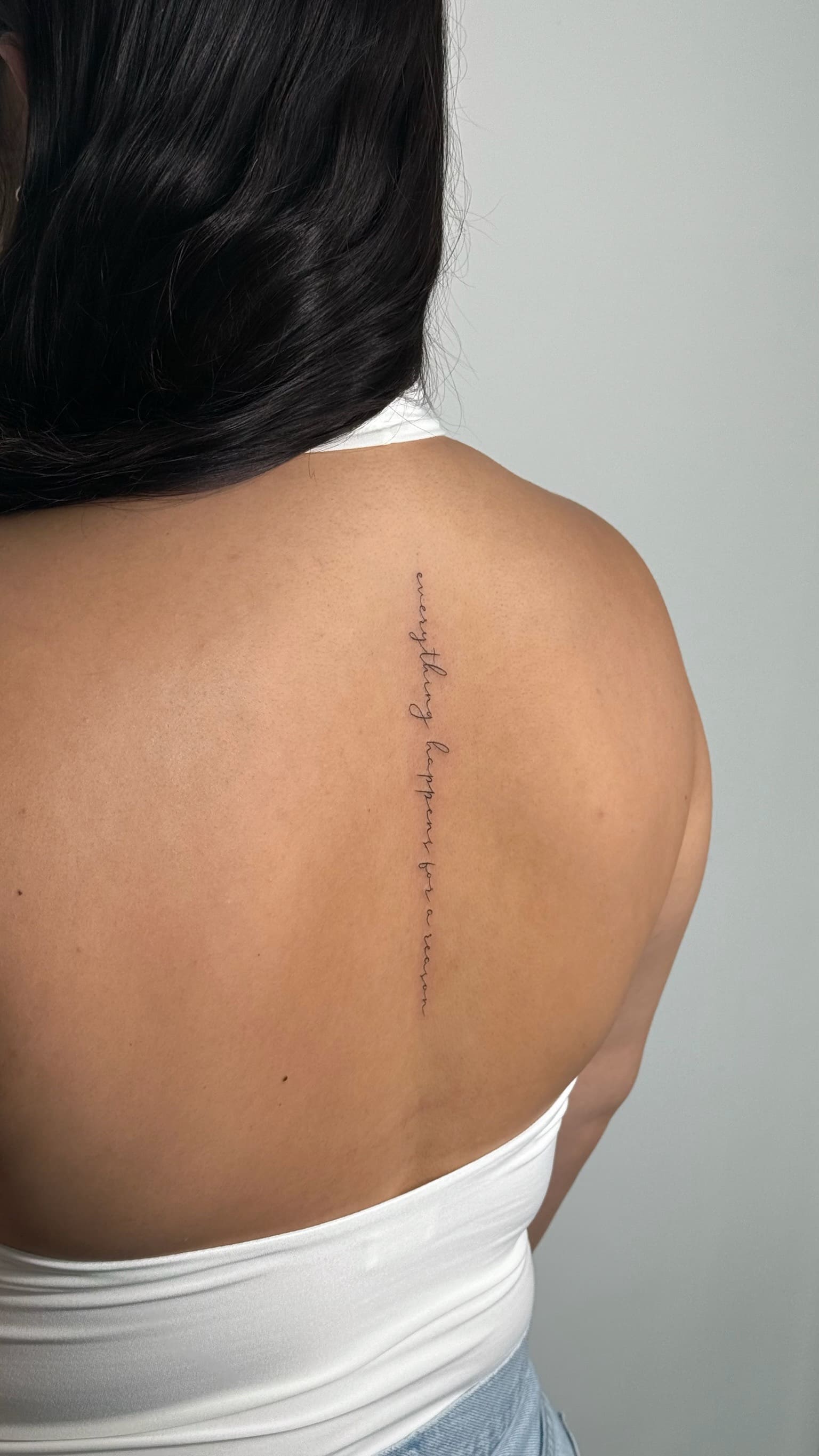 Vertical Spine Quote Tattoo